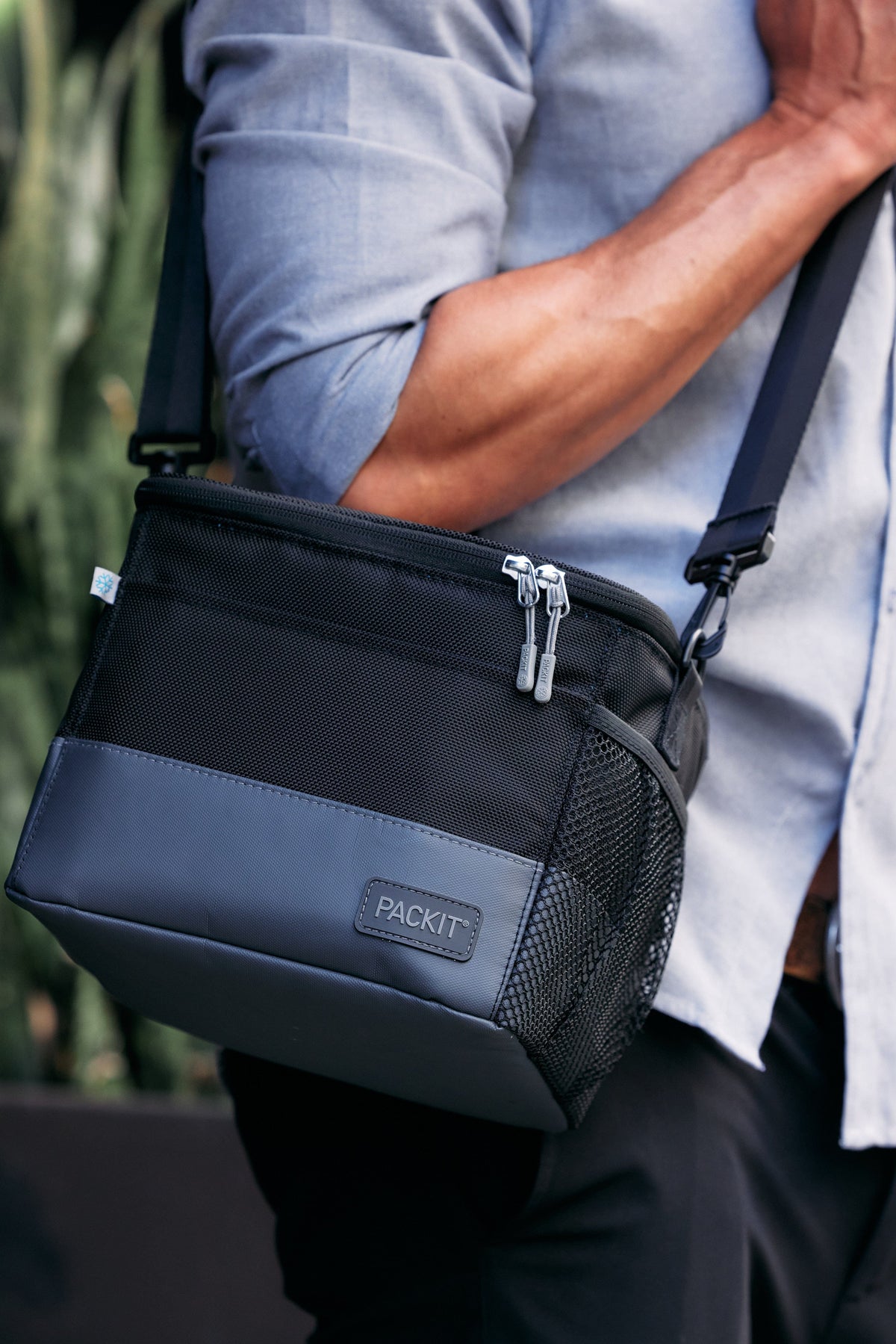 freezable-lunch-pail-g4 freezable-upright-lunch-pail-black-gray-lifestyle-male-city.jpg